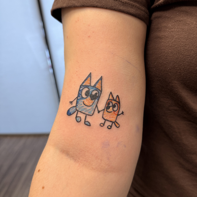 Bluey sister tattoo! — tattoo by Celtae Flint, Albany, New York